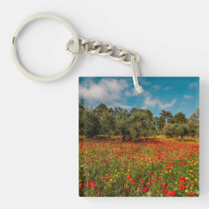 field with flowers and trees key ring