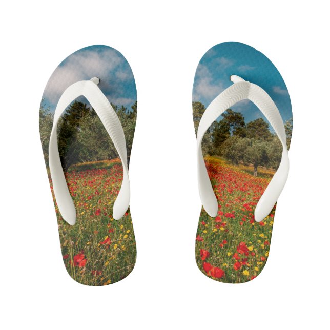 field with flowers and trees kid's flip flops (Footbed)