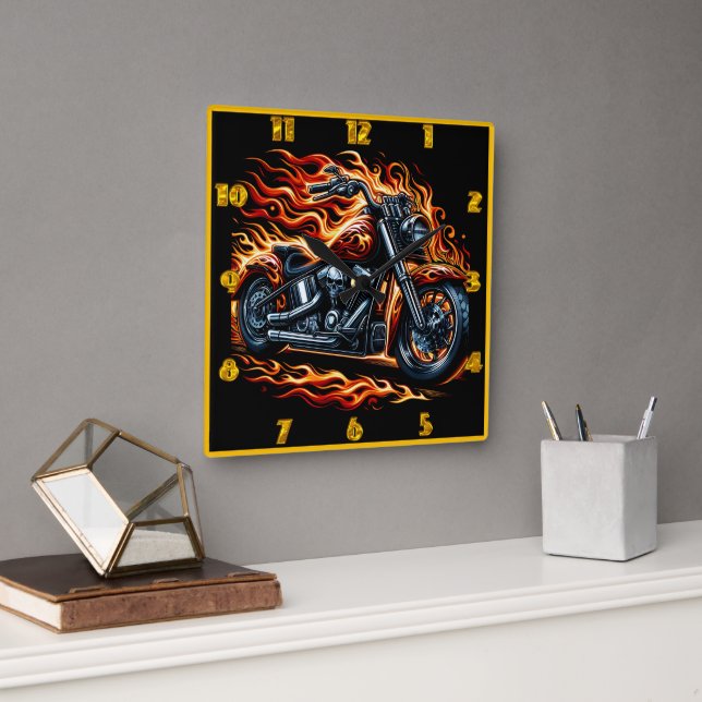 Fiery motorcycle revving in a blaze at sunset square wall clock (Office)