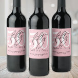 Fifty Fabulous Pink 50th Birthday Party Wine Label<br><div class="desc">Celebrate in style with this modern wine bottle label design, perfect for a “Fifty and Fabulous” birthday celebration or any milestone event. The label features a large white “50” across most of the space, with the word “fifty” written in elegant black script layered over it. Just below, “fabulous” appears in...</div>