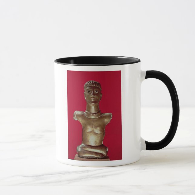 Figure of a god wearing a torque mug (Right)