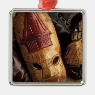 Fiji, Viti Levu Masks at a town market. Metal Tree Decoration