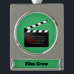 Film Crew Movies Swinging Hair and Makeup Silver Plated Banner Ornament<br><div class="desc">Change the text and font on the nameplate to whatever you want. I even think you can put background decorations. Take a scroll after you click on edit and check it out. You can change the text and font on the name plate. Perhaps you can put your favourite producer's name...</div>
