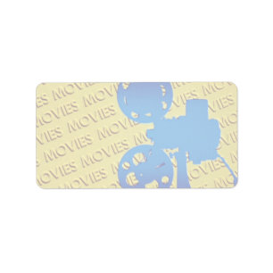 Film projector over yellow "movies" background label
