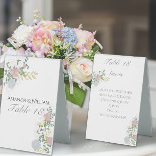 Finely flourished wedding table number & guests