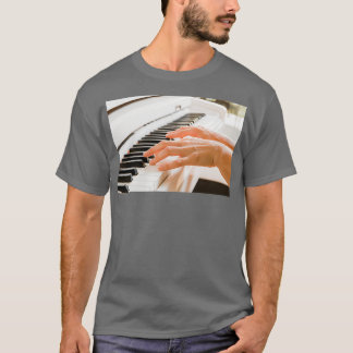 fingers and hands of a woman playing a white piano T-Shirt