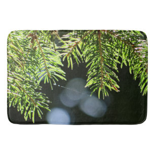 Fir pine needles with bokeh bath mat