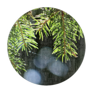Fir pine needles with bokeh cutting board