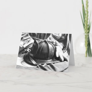 Fire helmet, gloves, flag card