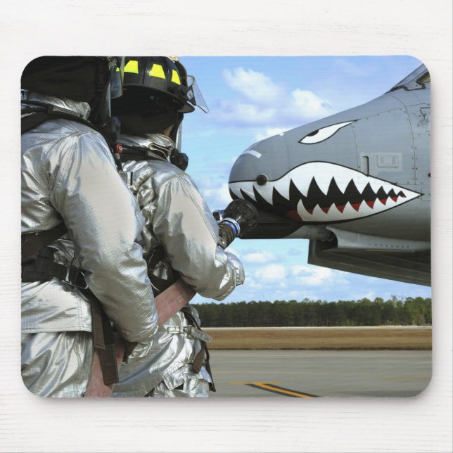 Firefighters deploy a fire hose during a drill mouse mat (Front)
