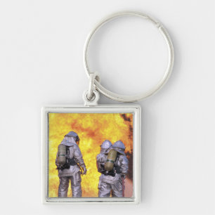 Firefighters extinguish an aircraft fire key ring