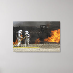 Firefighters neutralise a live fire canvas print