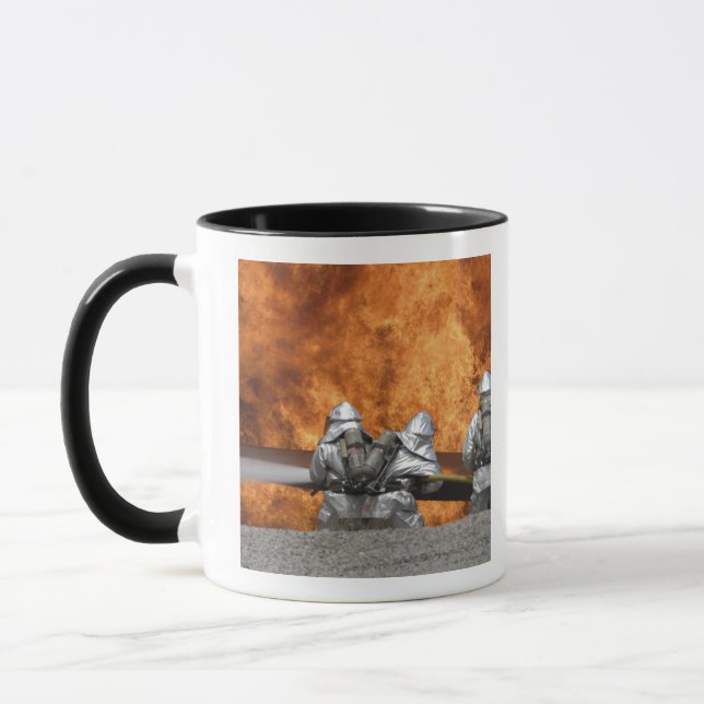 Firemen neutralise a fire mug (Left)