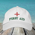 First Aid embroidered baseball cap Red / green<br><div class="desc">Embroidered Hats: Classic baseball cap with text "FIRST AID" for first aiders,  help staff,  event organizers,  medical staff</div>