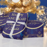 First Candle of Hanukkah Festival of Lights Party  Wrapping Paper<br><div class="desc">First Candle of Hanukkah. Happy Hanukkah Festival of lights party Wrapping Paper beauty Jewish holiday card. Beautiful Jewish Holiday Chanukah background with traditional Chanukah decorative symbols - wooden dreidels (spinning top), doughnuts, hanukkiah menorah, candles, star of David and glowing lights wallpaper gold hanukkiah navy blue pattern pattern. Hanukkah festival of...</div>