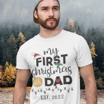 First Christmas as a dad - family matching cute T-Shirt<br><div class="desc">Show your joy for your very first Christmas as a dad with this lovely t-shirt decorated with a red Santa hat,  green holly leaves,  a golden ball,  a red heart,  and colourful Christmas lights.</div>