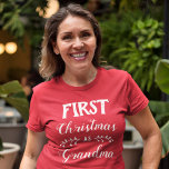First Christmas as grandma family matching T-Shirt<br><div class="desc">This red t-shirt is perfect for personalized Christmas matching family outfits. The caption reads "First Christmas as Grandma" in a white modern font. See my "Christmas matching Family Outfit & accessories" to find coordinating items for other family members. For further customization or other matching items, please feel free to contact...</div>