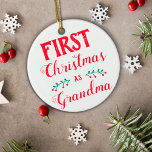 First Christmas as Grandma white with baby's photo Ceramic Tree Decoration<br><div class="desc">This Christmas tree ornament is perfect to celebrate your first Christmas as a Grandmother. It says "First Christmas as Grandma" in a modern red font on a white background. The other side features a customizable picture of the baby, with name and date of birth. For further customization or other matching...</div>