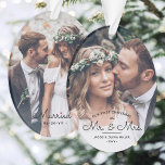First Christmas as Mr & Mrs • Elegant 2 Photo Ornament<br><div class="desc">Celebrate a joyful 1st holiday as a married couple with an elegant custom photo "Our First Christmas as Mr. & Mrs." oval acrylic ornament. The pictures and all wording on this template are simple to personalise. The black and white overlay design features simple elegant script calligraphy, modern minimalist typography names...</div>