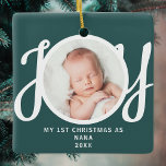 First Christmas As Nana Photo Keepsake Green Ceramic Ornament<br><div class="desc">This keepsake "First Christmas As Nana" photo ornament is decorated with the word 'JOY' in stylish script typography on a green background. Easily customisable.</div>