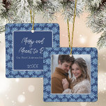 First Christmas Engaged Couples Photo Poinsettia Ceramic Ornament<br><div class="desc">Commemorate your first Christmas as an engaged couple with this beautiful photo ornament with a classic blue and white hand drawn poinsettia pattern featuring a photo on one side and your text on the back.</div>