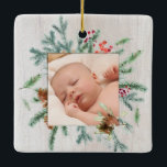 First Christmas Grandparents Winter Greenery Photo Ceramic Ornament<br><div class="desc">First Christmas as Grandma & Grandpa with Christmas greenery, holly berries and pine cones. Personalised with date and your beautiful photo framed in lush, winter greenery. Our high quality template makes it so easy for you to personalise your special ornament. Ornament makes a lovely gift that will be treasured for...</div>