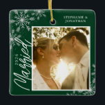 First Christmas Married Green Snowflakes Photo Ceramic Ornament<br><div class="desc">This square Christmas ornament is a perfect gift for the newly married couple. The design features a photo frame with handwritten text "Married" and is accented with light gray snowflakes on a dark green background. Personalize with a pictures of the couple,  their names and year.</div>