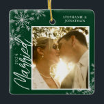 First Christmas Married Green Snowflakes Photo Ceramic Ornament<br><div class="desc">This square Christmas ornament is a perfect gift for the newly married couple. The design features a photo frame with handwritten text "Married" and is accented with light gray snowflakes on a dark green background. Personalize with a pictures of the couple,  their names and year.</div>