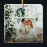 First Christmas Married Photo Keepsake Ceramic Ornament<br><div class="desc">Commemorate your first holiday season as a married couple with this romantic photo keepsake. Featuring your favourite wedding or newlywed photo with a handwritten script overlay, it captures the joy of your first Christmas together. A modern yet timeless design perfect for displaying on your tree or gifting to loved ones....</div>