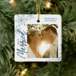 First Christmas Married Snowflakes Photo Ceramic Ornament<br><div class="desc">This square Christmas ornament is a perfect gift for the newly married couple. The design features a photo frame with handwritten text "Married" and is accented with light blue snowflakes. Personalize with a pictures of the couple,  their names and year.</div>