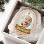 First Christmas Pink Baby Photo & Name Snow Globe Ceramic Tree Decoration<br><div class="desc">Magical gold snow globe and gold magical stars baby's first Christmas photo keepsake ornament. Pink and gold baby's first Christmas snow globe photo keepsake ornament can be customized with the baby's name, the year, and one photo on the front and one on the back. Original hand-drawn artwork by Moodthology papery....</div>