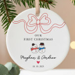 First Christmas Snowman Christmas Ceramic Tree Decoration<br><div class="desc">Celebrate your love this holiday season with our personalised Christmas ornament featuring an adorable snowman couple adorned with a trendy ribbon bow. This charming keepsake is perfect for commemorating your first Christmas together, adding a touch of warmth and joy to your festive decor. Crafted with care, it can be customised...</div>