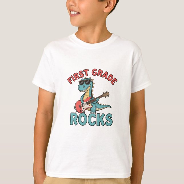 First Grade Rocks Dinosaur Guitar Back to School T-Shirt (Front)