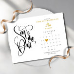 First Holy Communion Save the Date Calendar Announcement Postcard<br><div class="desc">This pretty first holy communion save the date card features a calendar and pretty gold love heart highlighting your special date. The reverse features gold heart confetti. Designed by Thisisnotme© ***TO MOVE THE HEART TO YOUR SPECIAL DATE, LOOK TO THE RIGHT OF THE PRODUCT IMAGE TO WHERE IT SAYS “PERSONALIZE...</div>