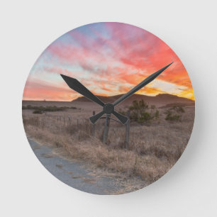 First Sunset of the Day Round Clock