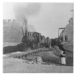 First train passing through the wall of Peking, Ch Tile