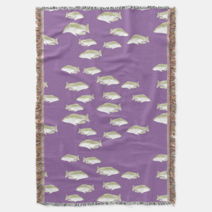 Fish on purple throw blanket
