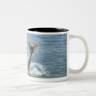 Fish splashing in the sea Two-Tone coffee mug