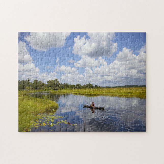 Fisherman on a lake in Guyana. Jigsaw Puzzle (Horizontal)
