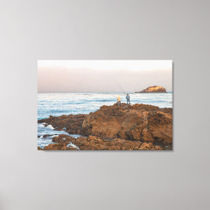 Fishermen on Rocky Shoreline at Sunrise Canvas Print
