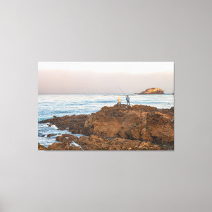 Fishermen on Rocky Shoreline at Sunrise Canvas Print