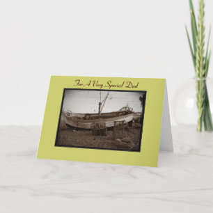 fishing boat with lobster pots on beach for dad card