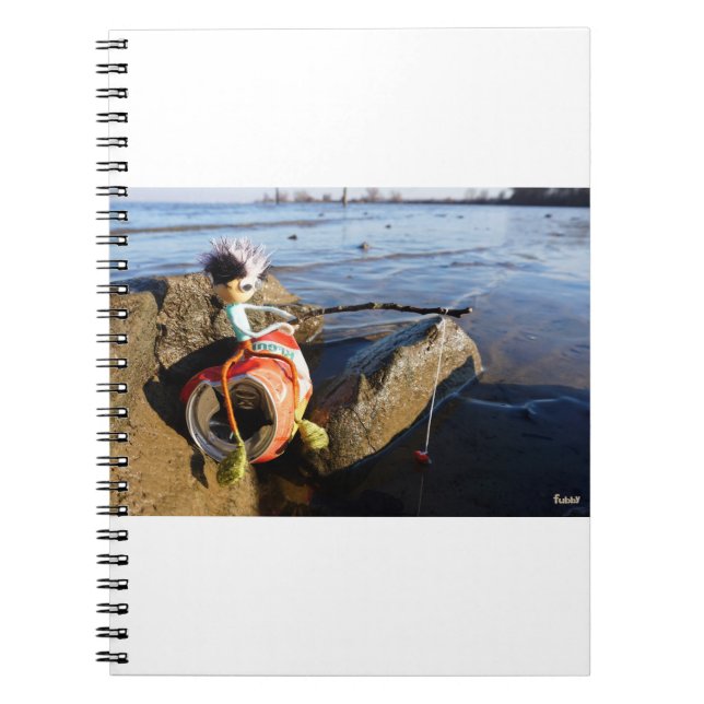 Fishing Fubby on a can at the water side. Notebook (Front)