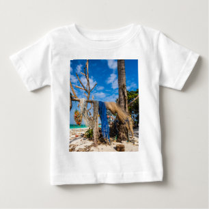 Fishing nets drying on the beach baby T-Shirt