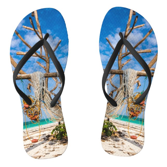 Fishing nets drying on the beach flip flops (Footbed)