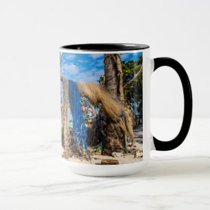 Fishing nets drying on the beach mug