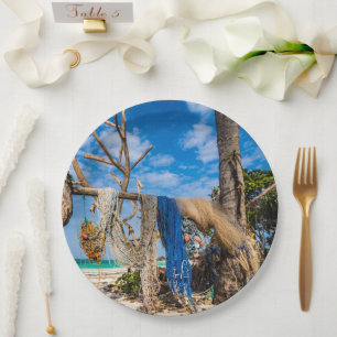 Fishing nets drying on the beach paper plate