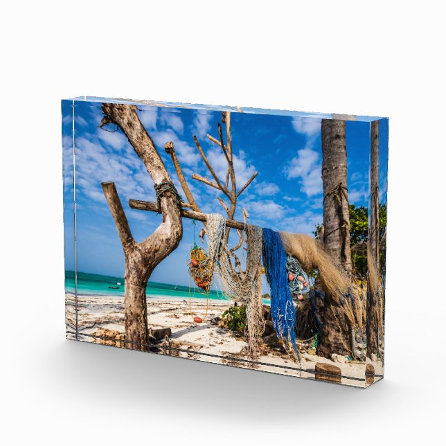 Fishing nets drying on the beach photo block (Right)