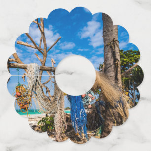 Fishing nets drying on the beach wine glass tag