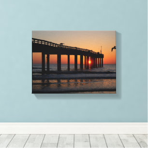 Fishing pier at sunrise canvas print